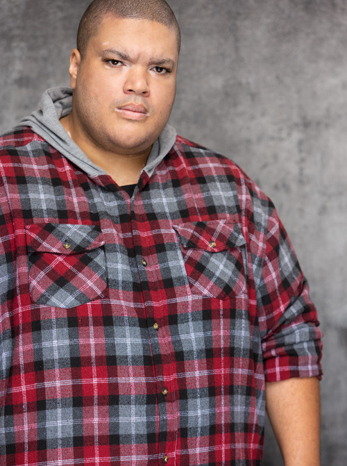 Joel Kawira commercial headshot from actors access profile. 