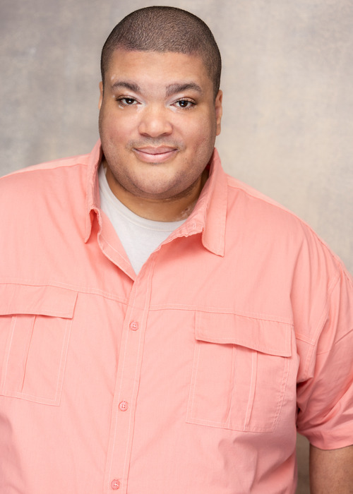 Joel Kawira commercial headshot from actors access profile. 